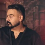 دانلود آهنگ جدید هم آغوش از امیرحسین افتخاری
